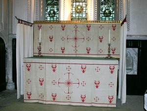 Riddle curtains evoke biblical connotations and liturgically separate the altar from the rest of the church, suggesting its sacredness and mystery. Vesting the altar recalls the high priests vestments and reminds us that Christ , symbolized by the altar, is our High Priest.