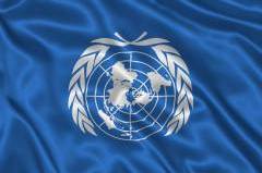 Flying a flag upside down is the international symbol of distress.  If there were ever an organization in distress, it seems to be the UN. 