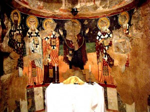 Fathers of the Church as well as the Virgin of the Sign depicted in the apse behind the altar.